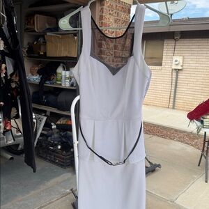 White Sleeveless Dress with Black Trim